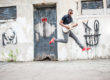 elliot holden-street-graffiti wall-guitar jump