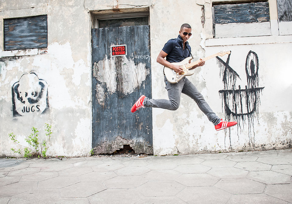elliot holden-street-graffiti wall-guitar jump